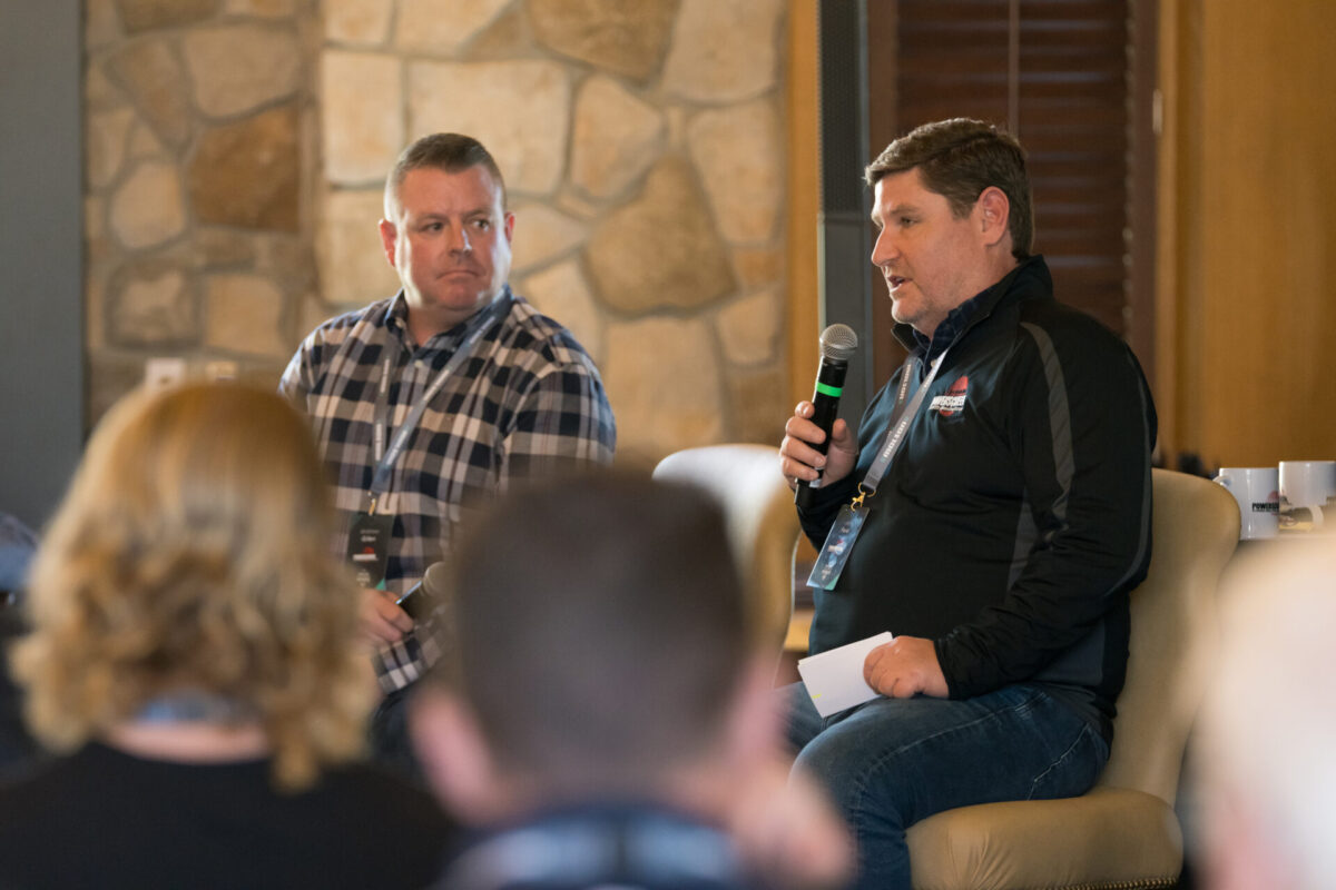 2 men giving a presentation