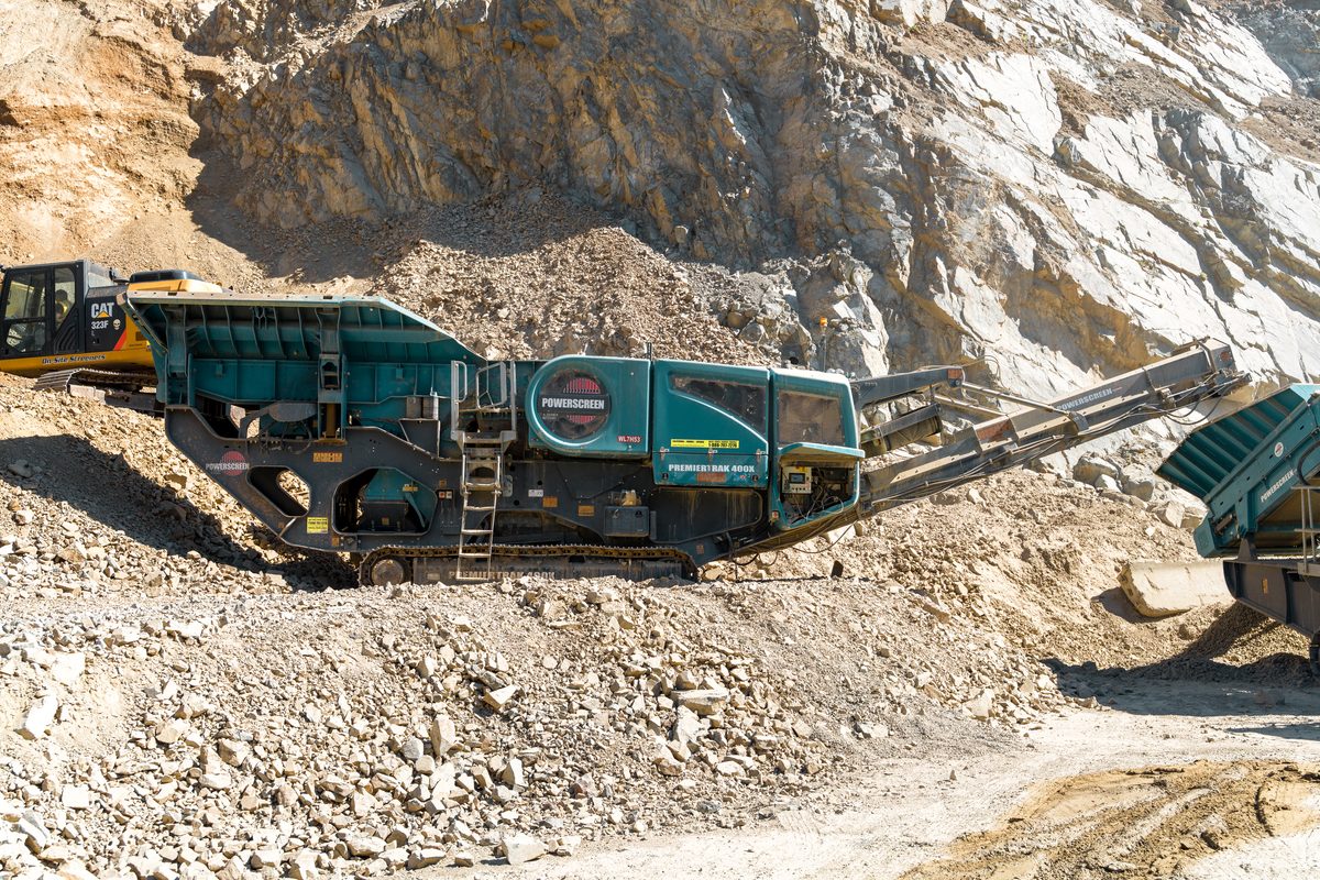 Powerscreen Premiertrak 400X crusher crushing in a quarry